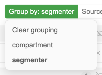 The Group By control reading Group by: segmenter, with its menu open listing Clear grouping and the available keys, compartment and segmenter